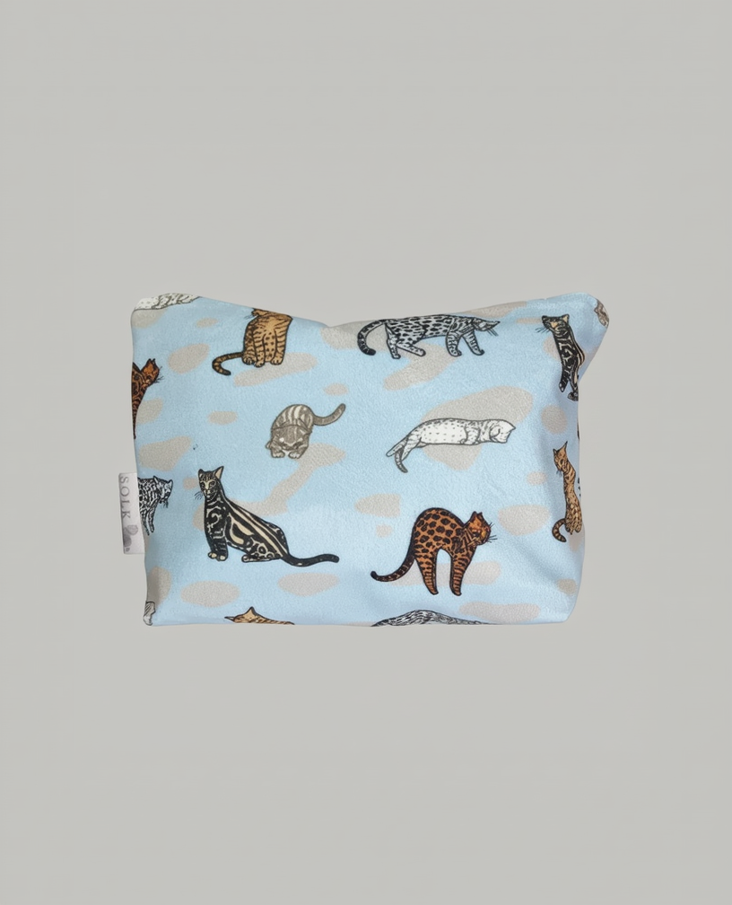 Fabric pouch with bengal cat pattern on a light blue background
