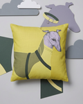 Yellow pillow with a dog design on a light gray background